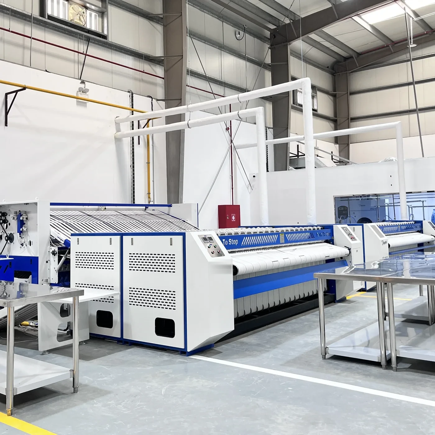 Industrial laundry ironing machine